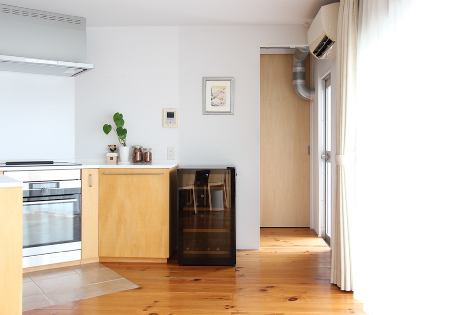 キッチン奥にはパントリーとランドリースペース